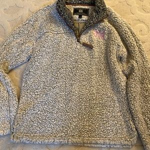 True Grit Pullover with Phi Mu Monogram on it